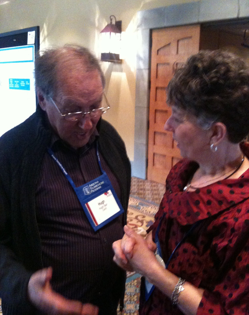 Hugh and Barb talking at conference